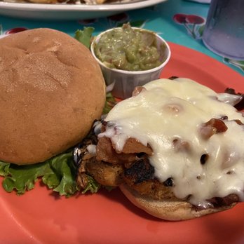 Sparky's Roadhouse Cafe - Grilled chicken sandwich with bacon and Monterey Jack cheese, guac in the side. (My friends dipped their garlic parm fries in the guac!) - Burgers Near Me - Eureka Springs, Arkansas Sparky's Roadhouse Cafe - Grilled chicken sandwich with bacon and Monterey Jack cheese, guac in the side. (My friends dipped their garlic parm fries in the guac!) - Burgers Near Me - Eureka Springs, Arkansas