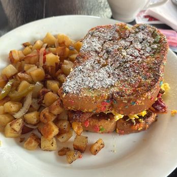 Holy Brunch - Fruity pebbles French toast sandwich and potatoes - Breakfast & Brunch Near Me - Kansas City, Missouri Holy Brunch - Fruity pebbles French toast sandwich and potatoes - Breakfast & Brunch Near Me - Kansas City, Missouri