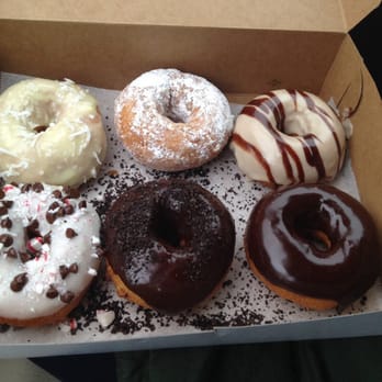 O's Donuts - Lemon w coconut, powdered, maple w chocolate drizzle, vanilla with peppermint and chocolate chips, chocolate and Oreo, chocolate - Donuts Near Me - Norfolk, Virginia O's Donuts - Lemon w coconut, powdered, maple w chocolate drizzle, vanilla with peppermint and chocolate chips, chocolate and Oreo, chocolate - Donuts Near Me - Norfolk, Virginia