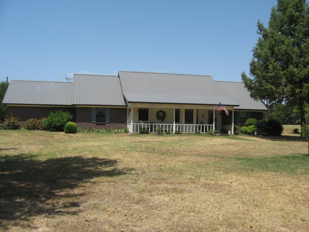 Slide of LMC Roofing & Construction