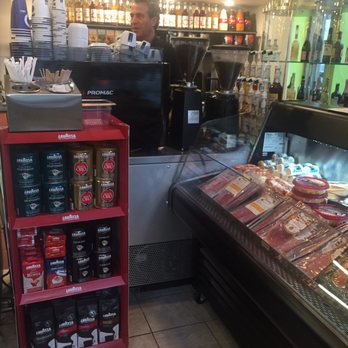 Limoncello - Chris and a collection of Monin syrups - Sandwiches Near Me - San Francisco, California Limoncello - Chris and a collection of Monin syrups - Sandwiches Near Me - San Francisco, California