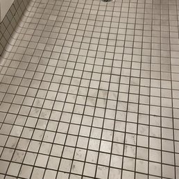 Extreme grime on the floor in ladies shower area. Extreme grime on the floor in ladies shower area.