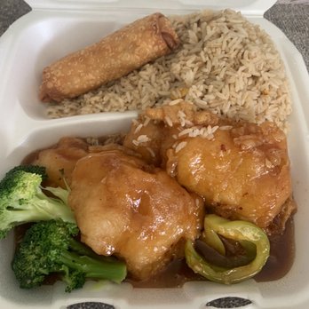 China Jade - a takeout container with rice, broccoli, and chicken - Chinese Near Me - Cleveland, Ohio