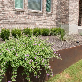 Red Sun Landscape Design - Custom steel planter box in the front yard. - Landscape Architects or Designers Near Me