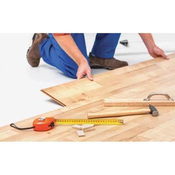 TNT Flooring - a man working on a hardwood floor - Flooring Near Me TNT Flooring - a man working on a hardwood floor - Flooring Near Me