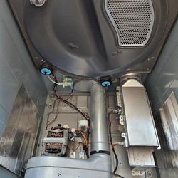 MD Appliance Repair - Cleaned dryer internal during repair.