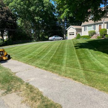 DRM Landscaping - a lawn being mowed - Landscaping Near Me DRM Landscaping - a lawn being mowed - Landscaping Near Me