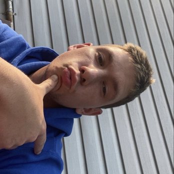 Wings - a man in a blue shirt holding a tennis racket - Canadian (New) Near Me - Division No. 11, Alberta Wings - a man in a blue shirt holding a tennis racket - Canadian (New) Near Me - Division No. 11, Alberta