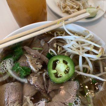 Broth & Basil - This is the pho with brisket and flank. I added some jalapeño and bean sprouts. You can partially see the mango tea. - Noodles Near Me - Pflugerville, Texas Broth & Basil - This is the pho with brisket and flank. I added some jalapeño and bean sprouts. You can partially see the mango tea. - Noodles Near Me - Pflugerville, Texas