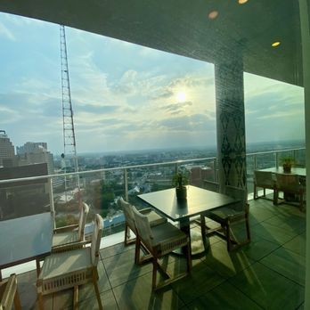 Moon's Daughter - Thompson San Antonio - Outdoor balcony seating penthouse lounge - Mediterranean Near Me - San Antonio, Texas