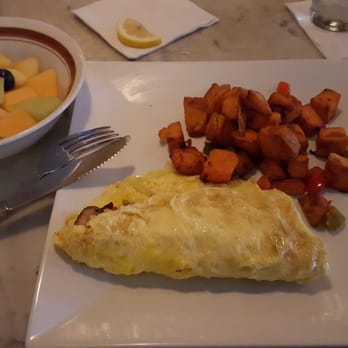 Hullabaloo - Denver omelette, no ham, sweet potato hash, and a side of fruit. - Gastropubs Near Me - West Palm Beach, Florida