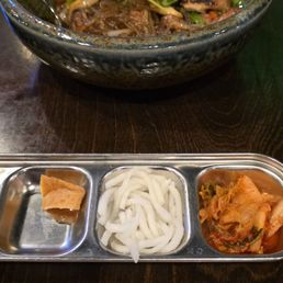 Japchae is stir-fried clear noodles with veggies and chicken. Fried pork dumplings. Beef Bulgogi fried rice with beef. Food was delicious. Japchae is stir-fried clear noodles with veggies and chicken. Fried pork dumplings. Beef Bulgogi fried rice with beef. Food was delicious.