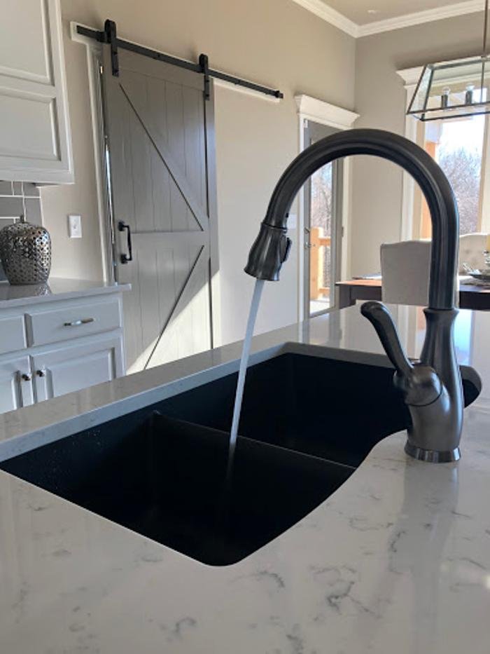 Slide of Snake 'n' Rooter Plumbing Company