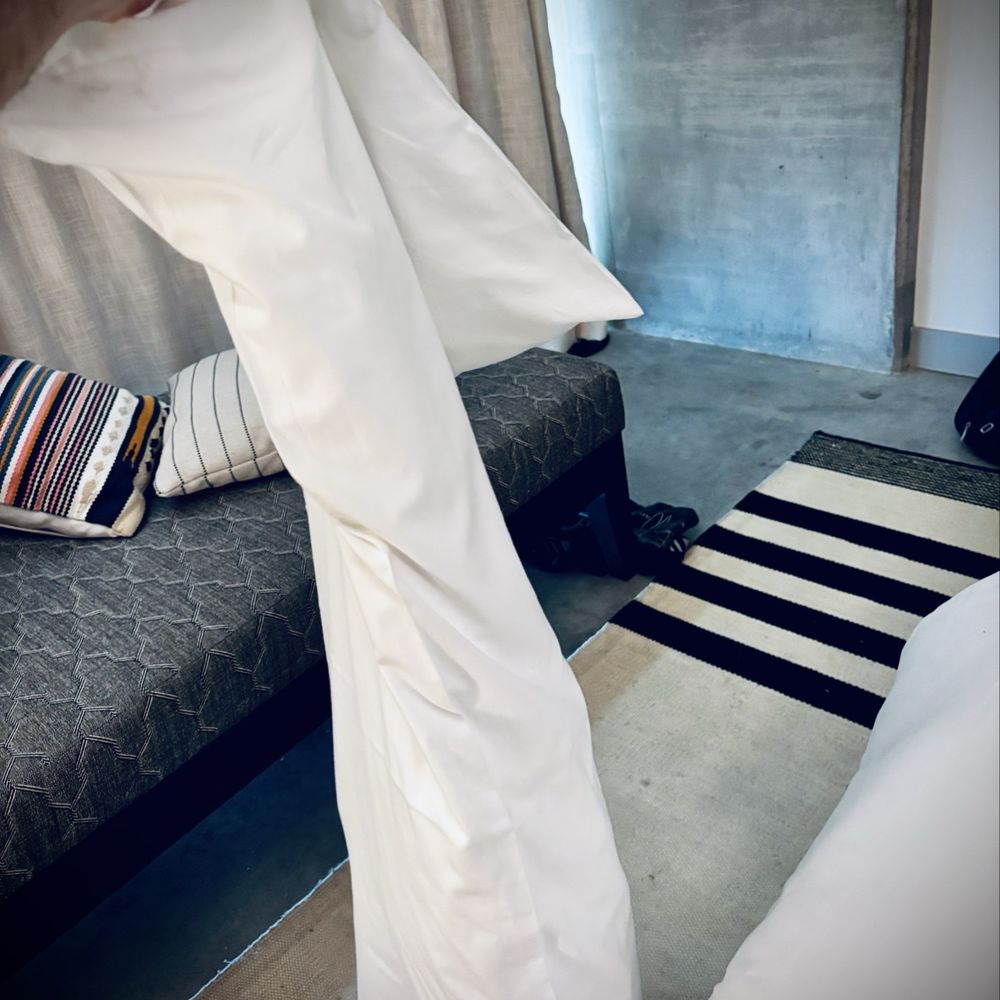 Canopy San Antonio Riverwalk - Sock cotton ball pillow. Hand for scale. - Hotels Near Me - San Antonio, Texas