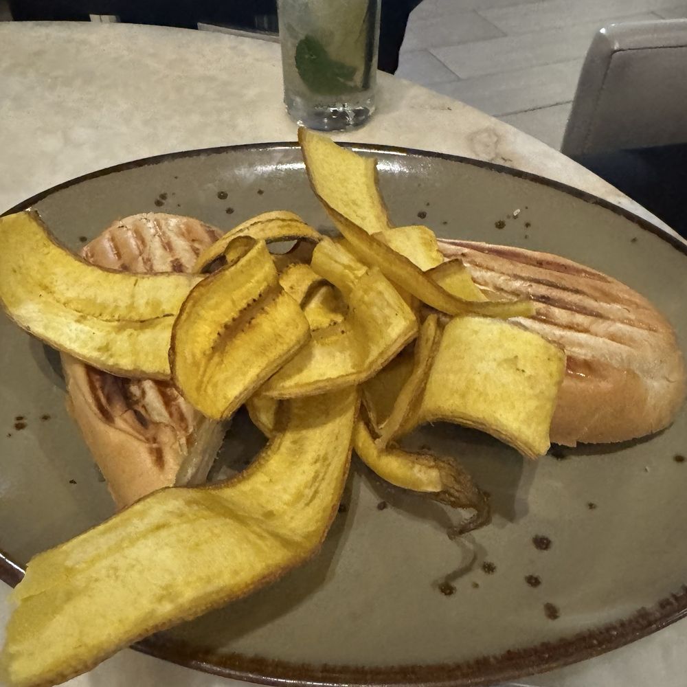 Cove Restaurant - Plantain chips served with the Cuban sandwich. Very pretty, not super flavorful though - Hotels Near Me - Miami, Florida Cove Restaurant - Plantain chips served with the Cuban sandwich. Very pretty, not super flavorful though - Hotels Near Me - Miami, Florida