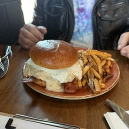 Breakfast burger and Cajun fries Breakfast burger and Cajun fries