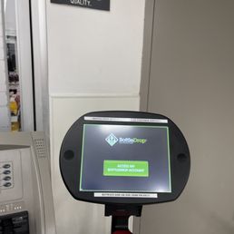 an atm machine at a gas station