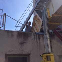 Worldwide Piano and Music School - Worldwide Piano lifting the piano into the house with a Crane. Spectacular professionals!