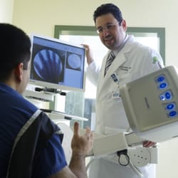 Dr Choueka using flouroscopy