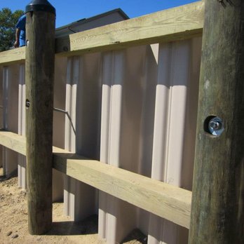 Advanced Marine Construction - a wooden fence and posts - General Contractors Near Me - Brick, New Jersey Advanced Marine Construction - a wooden fence and posts - General Contractors Near Me - Brick, New Jersey