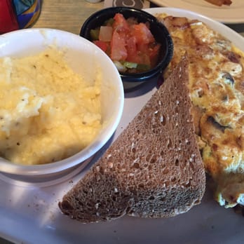 Two Chicks Cafe - Chicken omelet with to die for grits:))) - Breakfast & Brunch Near Me - New Orleans, Louisiana Two Chicks Cafe - Chicken omelet with to die for grits:))) - Breakfast & Brunch Near Me - New Orleans, Louisiana