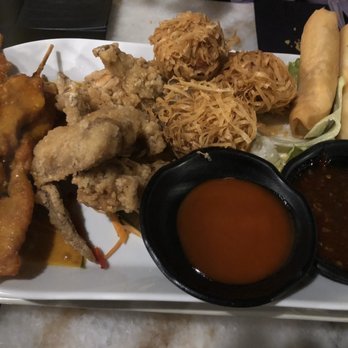Kopitiam Dublin - Appetizer plate- skewered satay chicken, chicken wings, shrimp balls, egg rolls. - Malaysian Near Me - Dublin, D Kopitiam Dublin - Appetizer plate- skewered satay chicken, chicken wings, shrimp balls, egg rolls. - Malaysian Near Me - Dublin, D