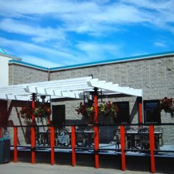 Taps Sports Bar & Grill - Enjoy our patio in the summer!