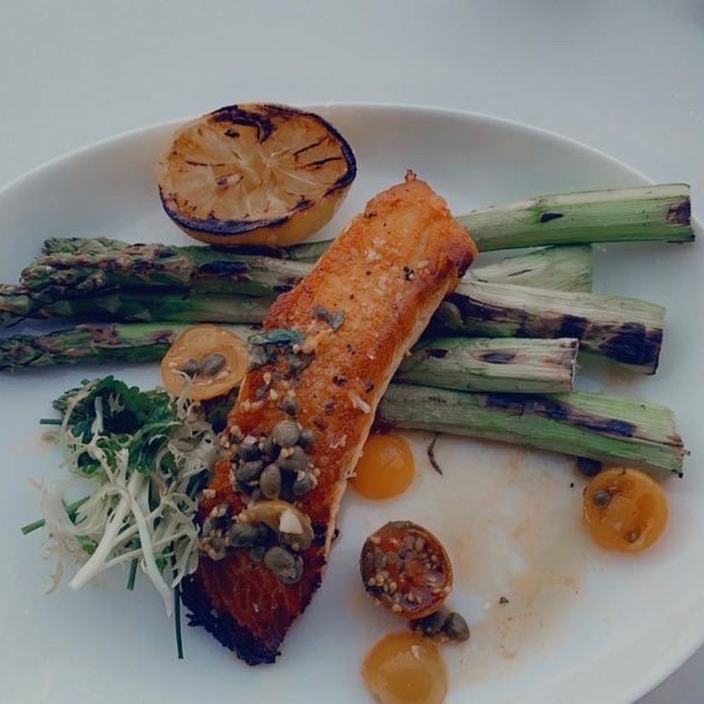 Thompson 105 - Roasted salmon with grilled asparagus/ blistered tomato and caper relish - Italian Near Me - Scottsdale, Arizona Thompson 105 - Roasted salmon with grilled asparagus/ blistered tomato and caper relish - Italian Near Me - Scottsdale, Arizona