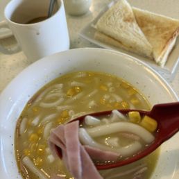 Breakfast special option C, noodles w ham and corn, egg toast, milk tea (hot or cold) included. Breakfast special option C, noodles w ham and corn, egg toast, milk tea (hot or cold) included.