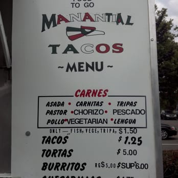 El Manantial Tacos - Simple yet delicious authentic Mexican food menu displayed outside the food truck. - Food Trucks Near Me - Berkeley, California