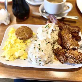 Ruby Sunshine Charlotte Southend - Biscuits and gravy, served with fried green tomato and fried chicken - Breakfast & Brunch Near Me - Charlotte, North Carolina Ruby Sunshine Charlotte Southend - Biscuits and gravy, served with fried green tomato and fried chicken - Breakfast & Brunch Near Me - Charlotte, North Carolina