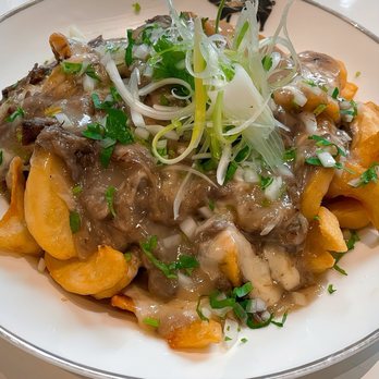 Breaking Dawn Brunch - Pho Poutine: Beef short rib, pho gravy, cheese curds, cilantro, onion mix over fries - Breakfast & Brunch Near Me - Los Gatos, California Breaking Dawn Brunch - Pho Poutine: Beef short rib, pho gravy, cheese curds, cilantro, onion mix over fries - Breakfast & Brunch Near Me - Los Gatos, California