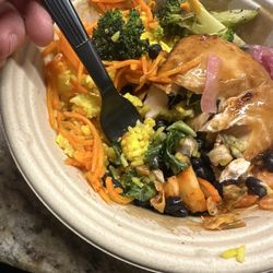 BIBIBOP Asian Grill - Salmon, kale, lemon turmeric rice, carrots, broccoli, pickled red onion, kimchi, black beans and ginger sauce. Soooo yummy!