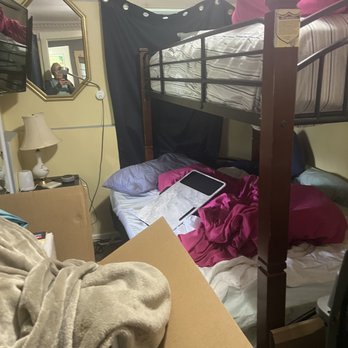 Capitol Corporate Housing - Overall condition of a how a bedroom was left by Ryan Hoover's choice tenants. - Real Estate Services Near Me
