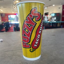 a paper cup with a chili on it a paper cup with a chili on it