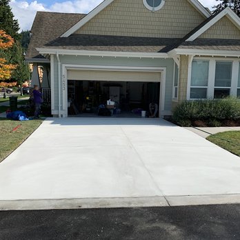 JFK Surfaces - a house with a garage and a fire hydrant - Flooring Near Me - Chilliwack, British Columbia JFK Surfaces - a house with a garage and a fire hydrant - Flooring Near Me - Chilliwack, British Columbia