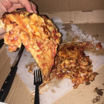 Bella Pizza - Actually removing a slice. - Pizza Near Me - Centreville, Virginia Bella Pizza - Actually removing a slice. - Pizza Near Me - Centreville, Virginia