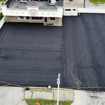 Armor Exterior Services - new 2" overlay of asphalt to entire parking lot - Roofing Near Me - Warren, Michigan Armor Exterior Services - new 2" overlay of asphalt to entire parking lot - Roofing Near Me - Warren, Michigan