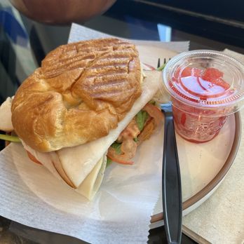 Cara Vana Coffee Shop - Turkey croissant sandwich made fresh to order with a little side of watermelon for only $10! - Coffee & Tea Near Me - Los Angeles, California Cara Vana Coffee Shop - Turkey croissant sandwich made fresh to order with a little side of watermelon for only $10! - Coffee & Tea Near Me - Los Angeles, California