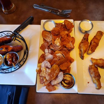 Murphy's Pub & Grill - Sausage sampler, pub chips, and fried pickles. Yum, yum, yum! - Gastropubs Near Me - Rapid City, South Dakota Murphy's Pub & Grill - Sausage sampler, pub chips, and fried pickles. Yum, yum, yum! - Gastropubs Near Me - Rapid City, South Dakota