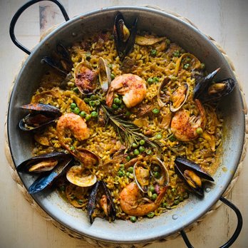Paella House Snohomish - Award-winning seafood paella made with local Penncove mussels, Manila clams, wild caught prawns and calamari. - Spanish Near Me - Snohomish, Washington
