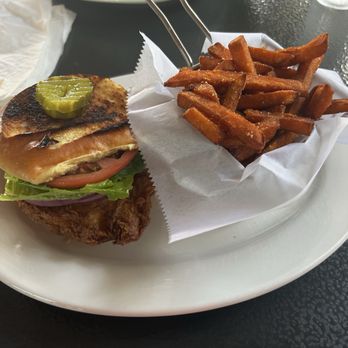 Uncle Hanks’ Hideaway - Delicious fried chicken sandwich, accompanied by sweet potato fries - American Near Me - Miami Springs, Florida