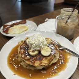 Bourbon Street Pancakes with a side of Baked Bacon, over easy eggs and Salted Caramel Cold Brew. Bourbon Street Pancakes with a side of Baked Bacon, over easy eggs and Salted Caramel Cold Brew.