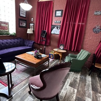 Grand Central Perk Express - a living room with a purple couch and purple chairs - Coffee & Tea Near Me - North Judson, Indiana