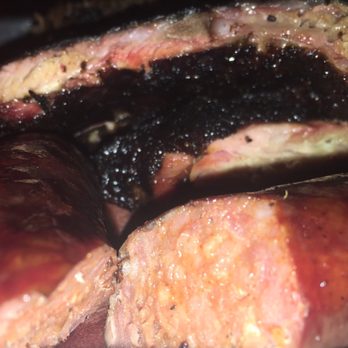 Doc's Commerce Smokehouse - Sausage blows away cute lil ribs - Barbeque Near Me - Milwaukee, Wisconsin