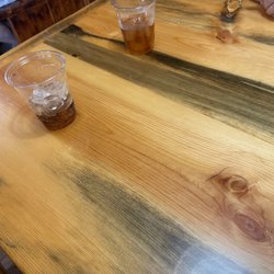 Scapegoat Eatery - Handmade wood tables.