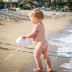 Sand Bay Beach Resort - Naked baby boy walking on the beach