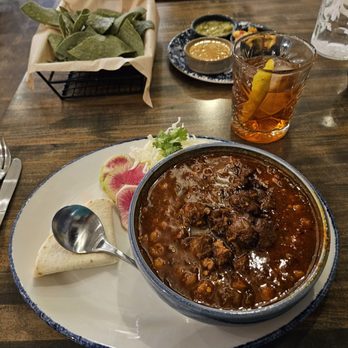 Santo - Posole with pork adovado  (see radishes slices that were not in salad) - New Mexican Cuisine Near Me - Boulder, Colorado