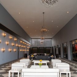 Flourish - The Flourish Courtyard with white and black furniture groupings.