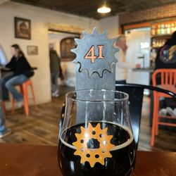 GearHouse Brewing - Beer with part of the brewery in the background